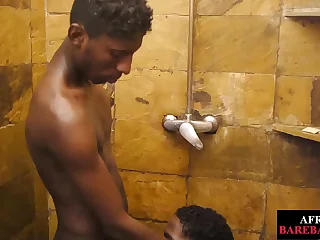 A shower session turns steamy as a dark-skinned stud services an amateur twink, then plows him raw. This ebony gay romp showcases intense dick sucking, raw action, and a hot cock creampie.