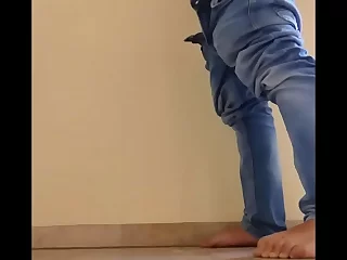 German boy's solo show in the hallway. He's jerking off, hoping his cum stays on the floor without waking up his neighbors. Watch him stroke and moan to climax.