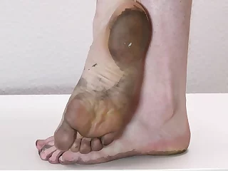 Craving grubby toes? This amateur video delivers! Close-ups of dirty feet, toes, and soles will fulfill your fetish. Naked feet and heels in all their glory - a must-see for feet lovers.