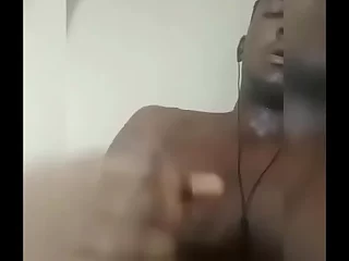 A young Nigerian gay lad flaunts his BBC, stroking it to a creamy climax. His moans and blushing face add to the raw, homemade charm of this steamy gay amateur wank session.